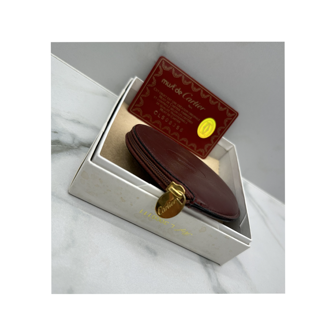 PRELOVED CARTIER MUSTLINE LEATHER COIN CASE IN BURGUNDY